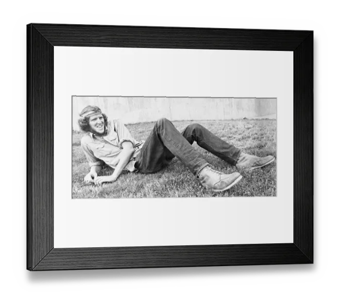 Framed Print : Bill Walton Lying On Grass Framed Print : Bill Walton Lying On Grass