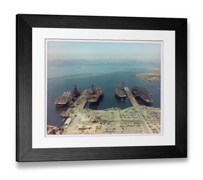 Framed Print : Military Plane Carriers near Docks Framed Print : Military Plane Carriers near Docks