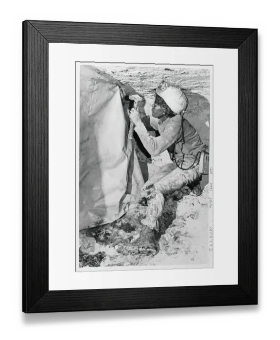 Framed Print : Olivia Rowe Excavating from Rock Formation Framed Print : Olivia Rowe Excavating from Rock Formation