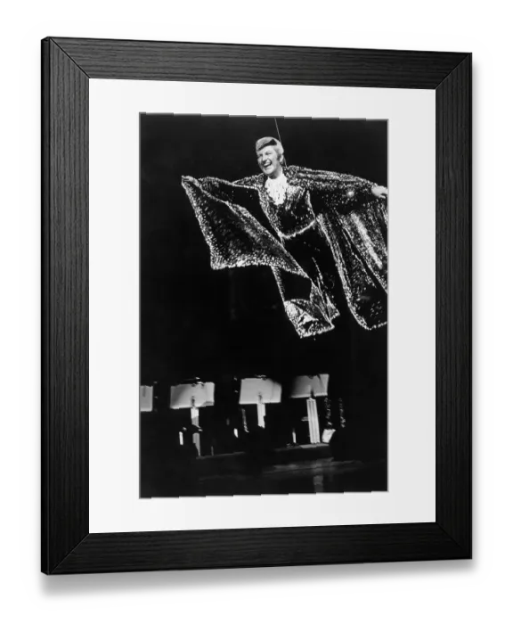 Framed Print : Liberace. Flying over the music stands of the orchestra Framed Print : Liberace. Flying over the music stands of the orchestra