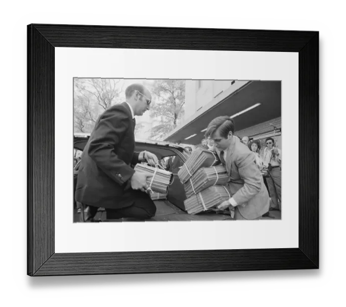 Framed Print : Man Takes Transcripts Out Of Car Framed Print : Man Takes Transcripts Out Of Car