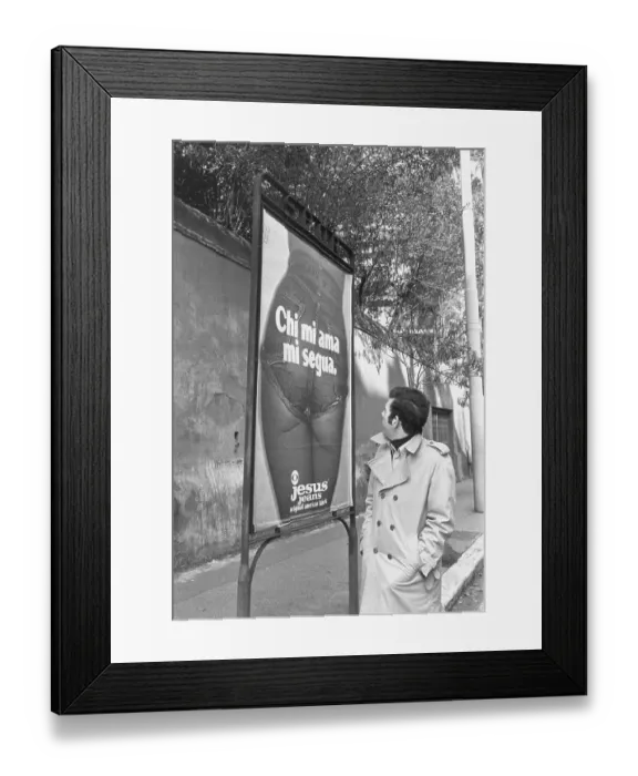 Framed Print : Man Viewing Controversial Jeans Ad Framed Print : Man Viewing Controversial Jeans Ad