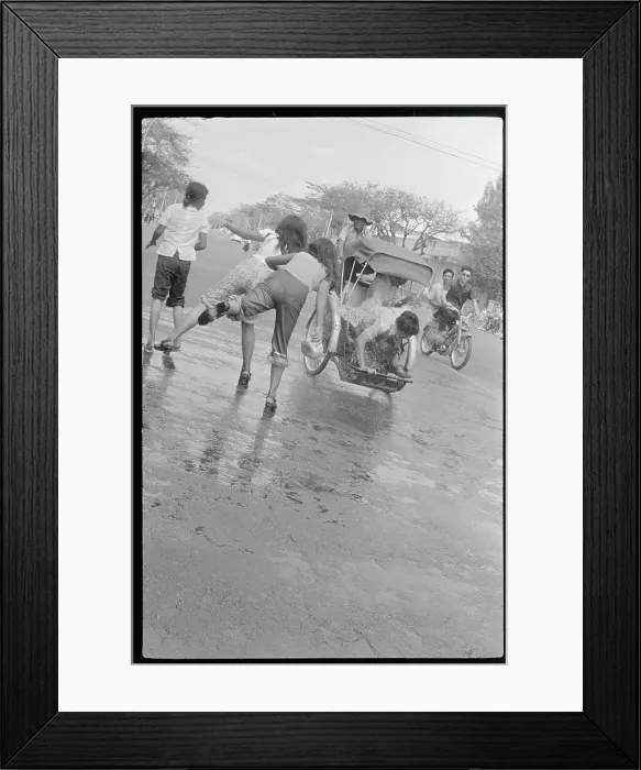 Framed Print : Girls Throwing Water Framed Print : Girls Throwing Water
