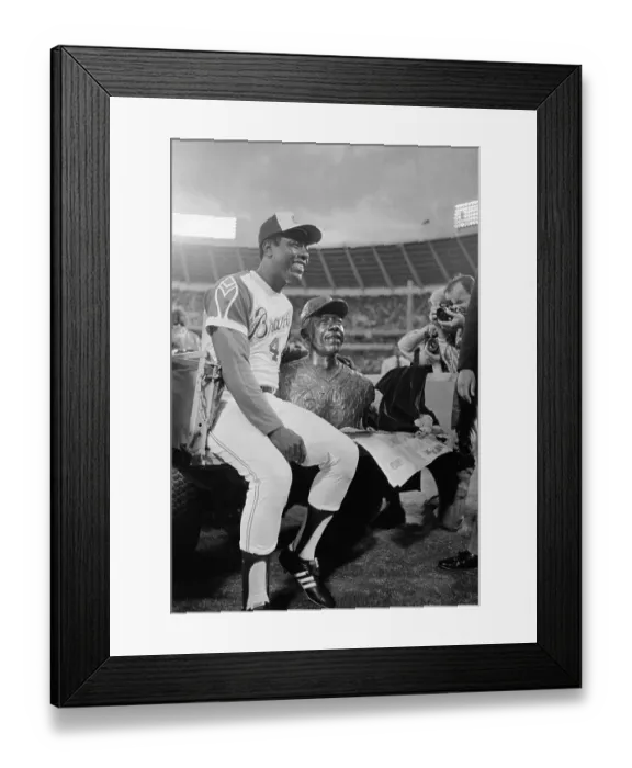 Framed Print : Hank Aaron Sitting with Sculpture Bust of Himself Framed Print : Hank Aaron Sitting with Sculpture Bust of Himself
