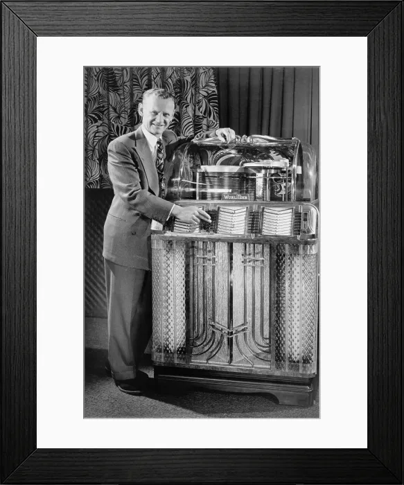 Framed Print : Sammy Kaye Posing with a Wurlitzer Jukebox Framed Print : Sammy Kaye Posing with a Wurlitzer Jukebox