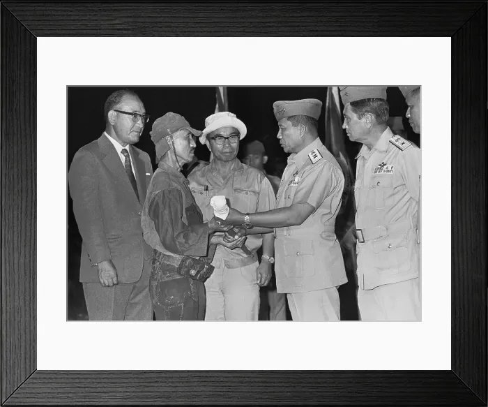 Framed Print : Japanese Officer Surrendering His Weapon Framed Print : Japanese Officer Surrendering His Weapon