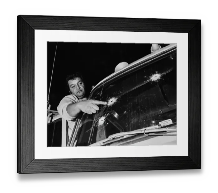 Framed Print : Truck Driver Pointing At Windscreen Bullet Holes Framed Print : Truck Driver Pointing At Windscreen Bullet Holes