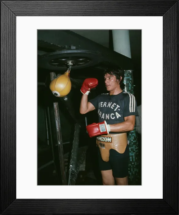 Framed Print : Carlos Monzon With Punching Bag
