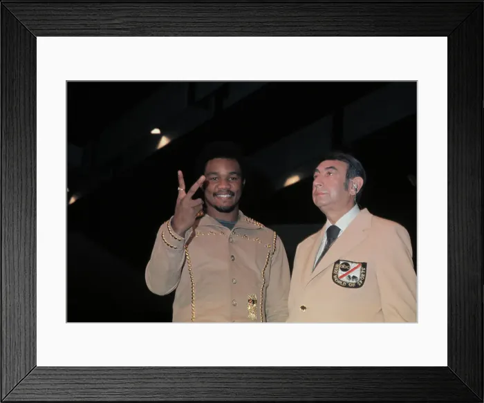 Framed Print : George Foreman with Commentator Howard Cosell Framed Print : George Foreman with Commentator Howard Cosell