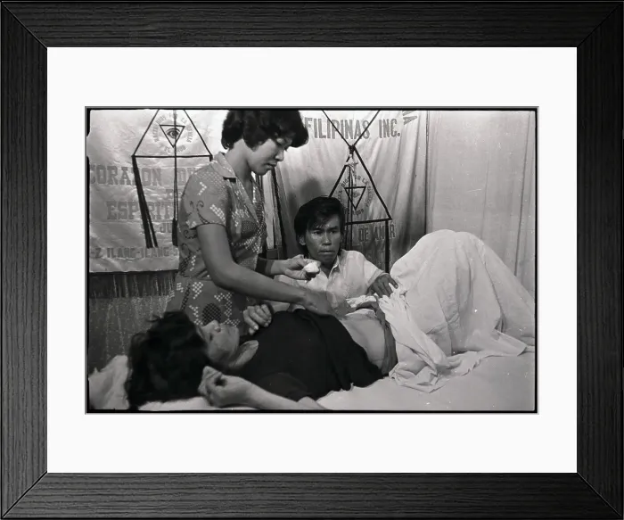Framed Print : Alex Orbito Examines a Patient's Abdomen Framed Print : Alex Orbito Examines a Patient's Abdomen