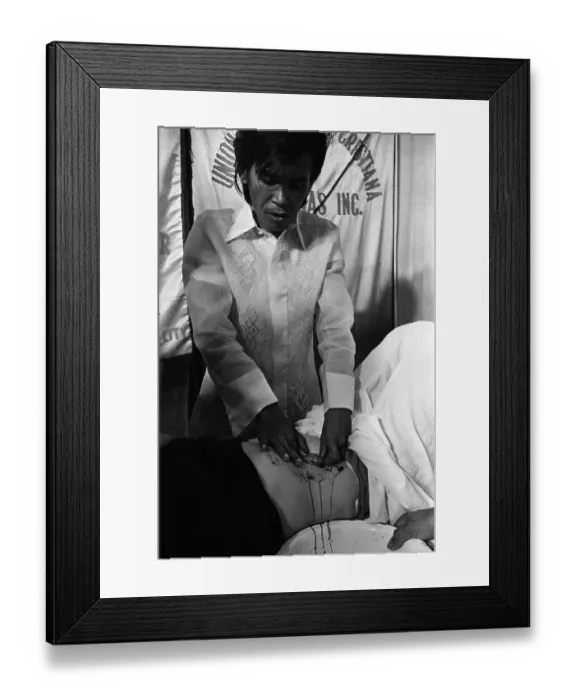 Framed Print : Alex Orbito Applies Pressure to Patient Framed Print : Alex Orbito Applies Pressure to Patient