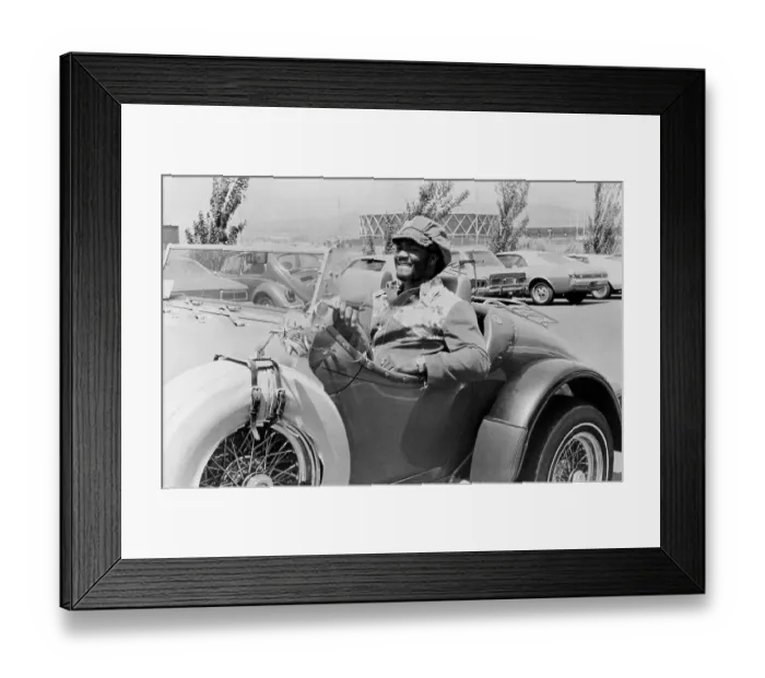 Framed Print : George Foreman Riding In Sports Car Framed Print : George Foreman Riding In Sports Car