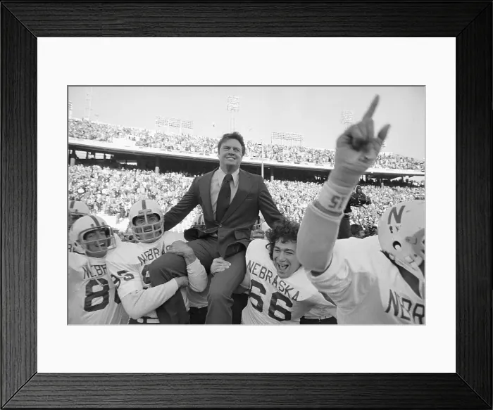 Framed Print : Coach Tom Osborne Being Carried by His Team After Football Game Win Framed Print : Coach Tom Osborne Being Carried by His Team After Football Game Win