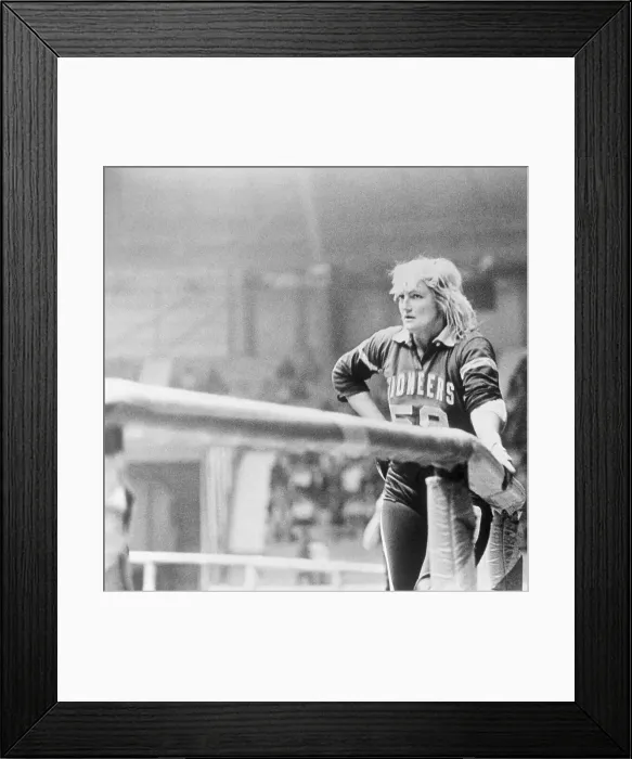 Framed Print : Joan Weston Leaning on Roller Derby Side Rail