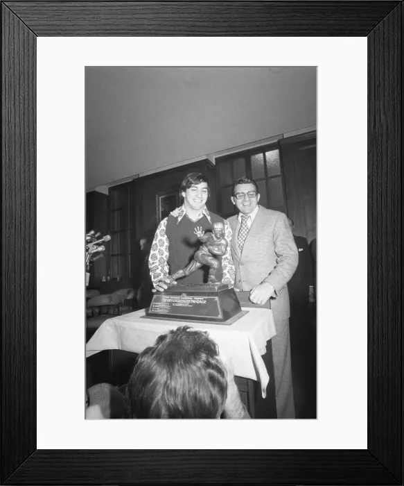Framed Print : Joe Paterno Looks at Heisman Trophy Framed Print : Joe Paterno Looks at Heisman Trophy