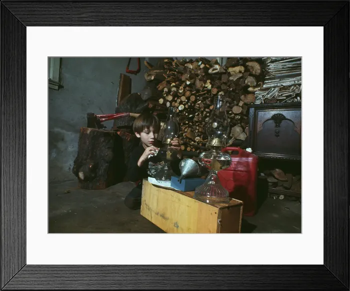 Framed Print : Boy Preparing Oil Lamps Framed Print : Boy Preparing Oil Lamps