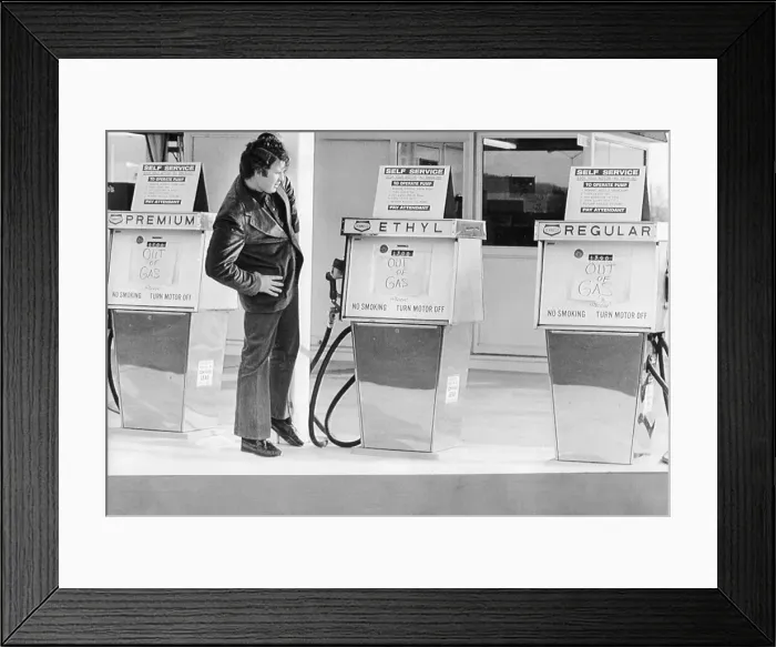 Framed Print : Man Reading Gasoline Signs Framed Print : Man Reading Gasoline Signs