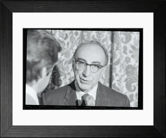 Framed Print : Michael DeBakey Speaking to Journalist