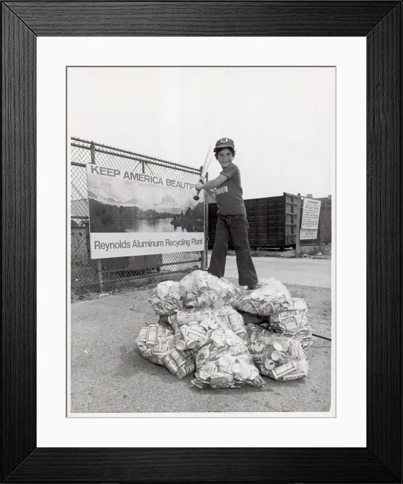 Framed Print : Boy Exchanges Aluminum Cans for Bats