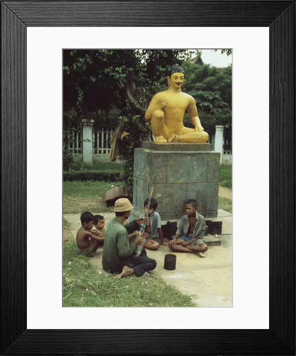 Framed Print : Man Playing Instrument In Phnom Penh Framed Print : Man Playing Instrument In Phnom Penh