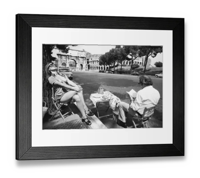 Framed Print : Couple Picnicking near Monumental Structures Framed Print : Couple Picnicking near Monumental Structures