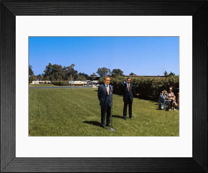 Framed Print : Henry Kissinger Speaking at Microphone on Lawn Framed Print : Henry Kissinger Speaking at Microphone on Lawn