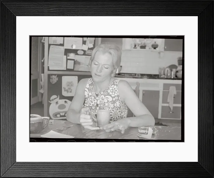 Framed Print : Mrs. Marietta Jaeger Sitting and Holding Cup Framed Print : Mrs. Marietta Jaeger Sitting and Holding Cup