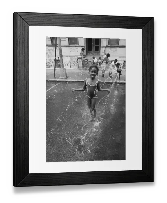 Framed Print : Little Girl Skips in Spray of Hydrant Framed Print : Little Girl Skips in Spray of Hydrant