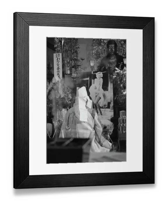 Framed Print : Marilyn Monroe's Picture in Front of a Buddhist Statue Framed Print : Marilyn Monroe's Picture in Front of a Buddhist Statue