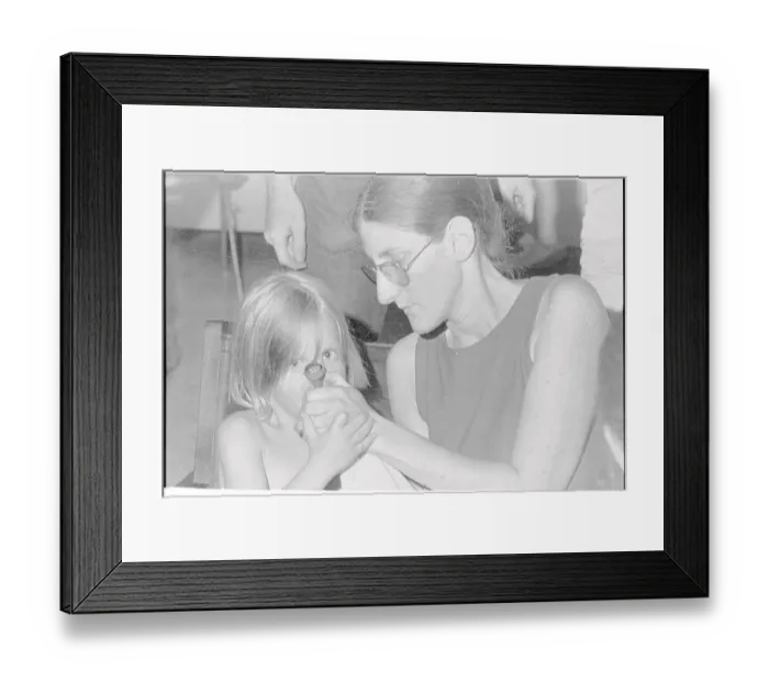 Framed Print : Woman Helping Young Child Smoke Pipe Framed Print : Woman Helping Young Child Smoke Pipe