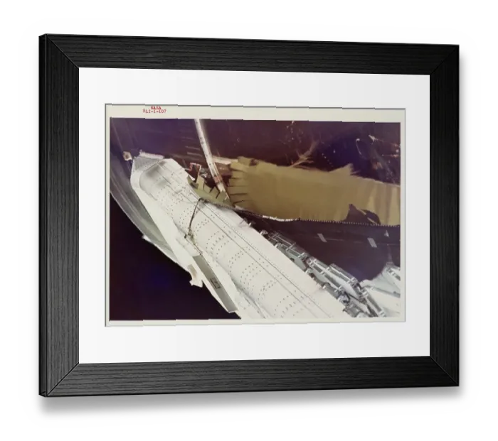 Framed Print : OWS SAS. Close-up view of damaged and partially deployed OWS SAS wing showing Framed Print : OWS SAS. Close-up view of damaged and partially deployed OWS SAS wing showing