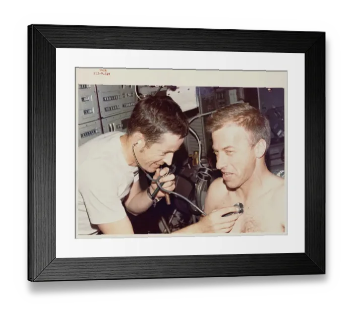 Framed Print : Paul J Weitz, Skylab II pilot, gets a physical examination Framed Print : Paul J Weitz, Skylab II pilot, gets a physical examination