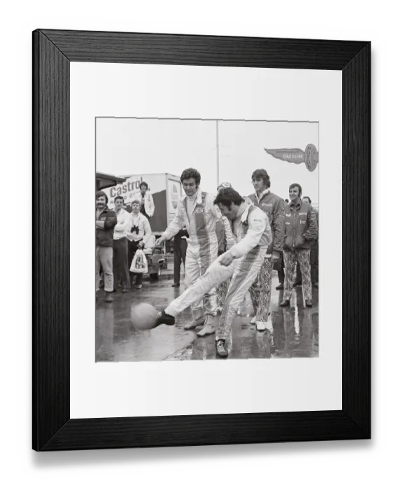 Framed Print : Mario Andretti Kicking Soccer Ball