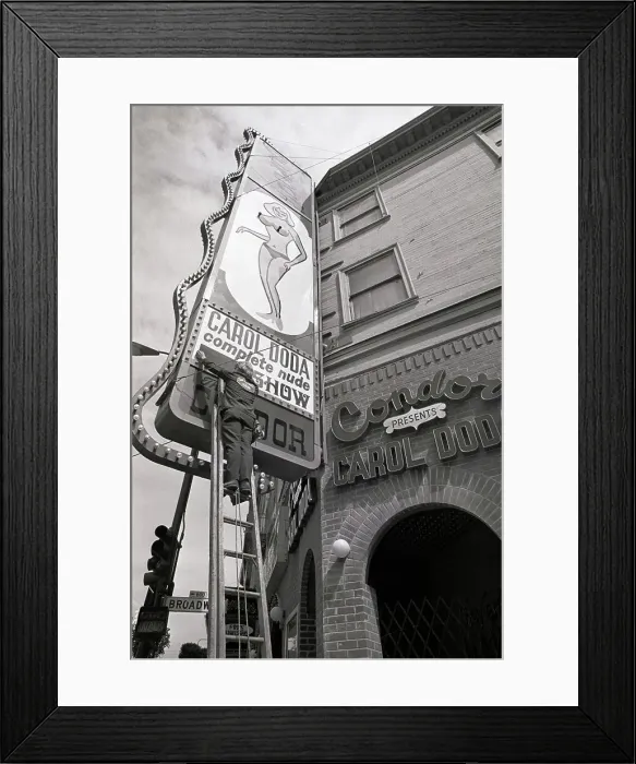 Framed Print : Man Covering Sex On Nightclub Sign Framed Print : Man Covering Sex On Nightclub Sign