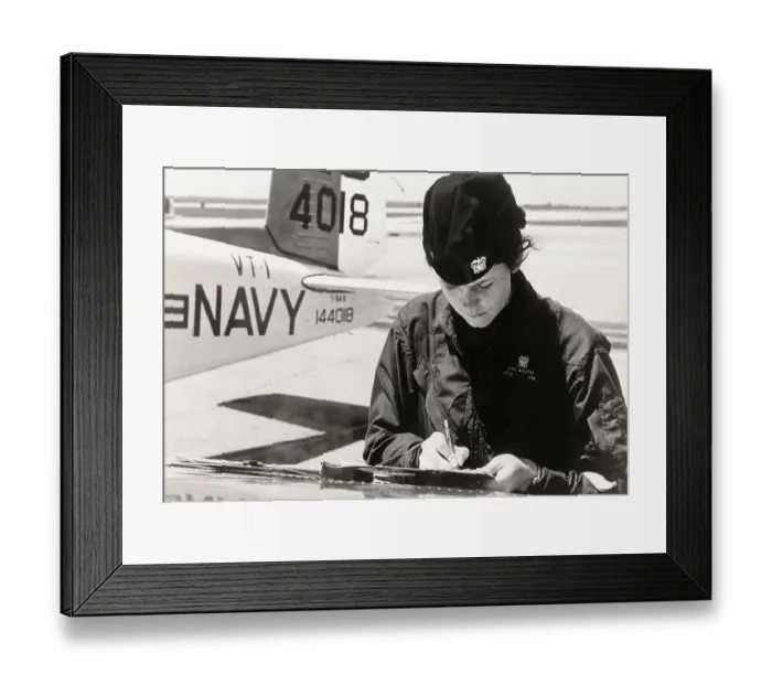 Framed Print : Female Flyer in Front of Plane Framed Print : Female Flyer in Front of Plane