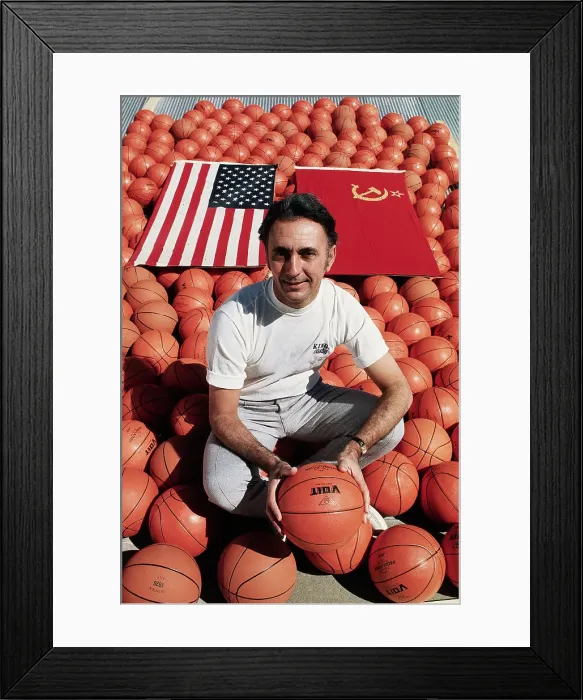 Framed Print : Bob Cousy Squatting Amidst Basketballs Framed Print : Bob Cousy Squatting Amidst Basketballs