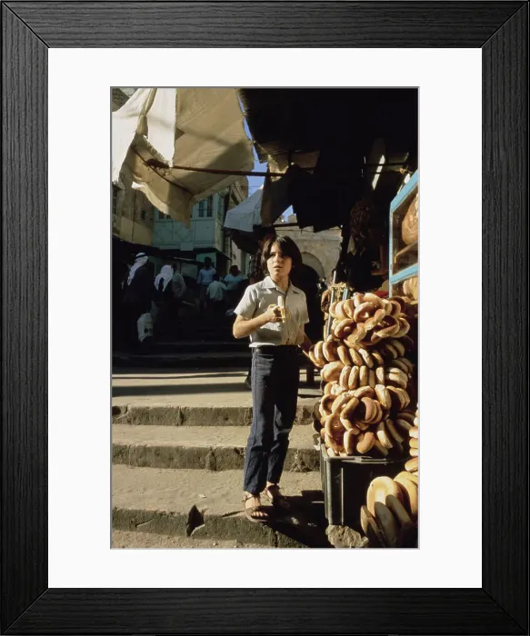 Framed Print : Brandon Cruz stands outside a gate in Old City Framed Print : Brandon Cruz stands outside a gate in Old City
