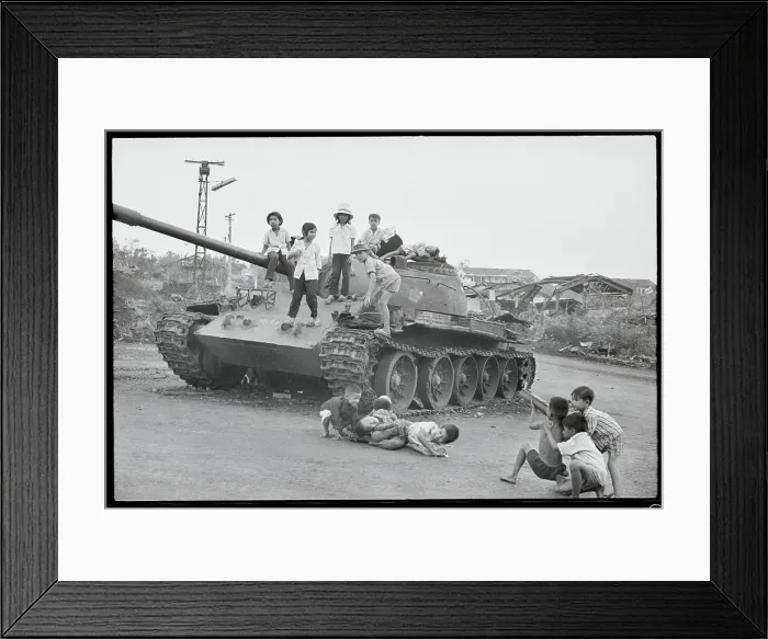 Framed Print : Children Playing with Communist Tank Framed Print : Children Playing with Communist Tank