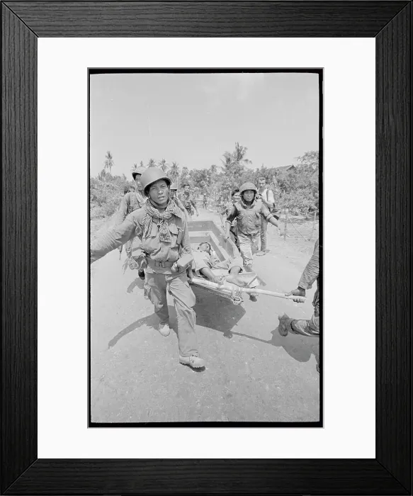 Framed Print : Soldiers Pulling Wounded Comrade Framed Print : Soldiers Pulling Wounded Comrade