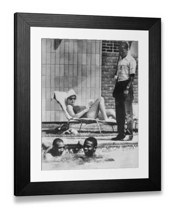 Framed Print : Two Men Swimming in Pool While Others Look On Framed Print : Two Men Swimming in Pool While Others Look On