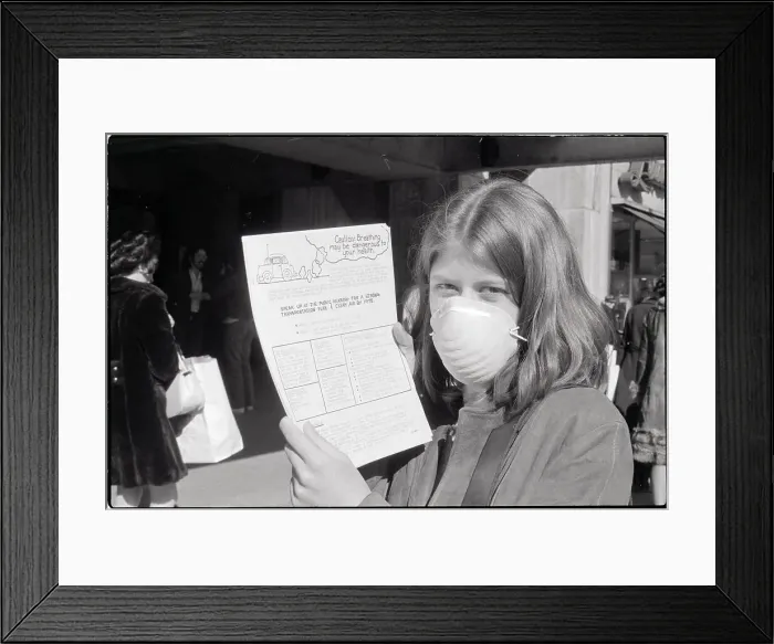 Framed Print : Woman In Face Mask Holding Flyer Framed Print : Woman In Face Mask Holding Flyer