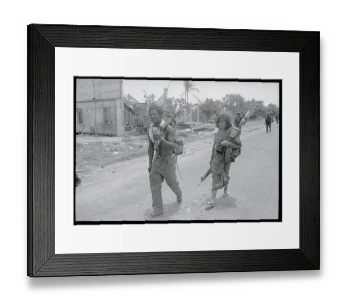 Framed Print : Cambodian Soldier and Wife Fleeing Framed Print : Cambodian Soldier and Wife Fleeing
