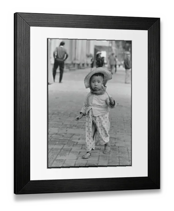 Framed Print : Child Wandering Down Street Framed Print : Child Wandering Down Street