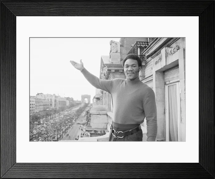 Framed Print : George Foreman Waving from Hotel Framed Print : George Foreman Waving from Hotel