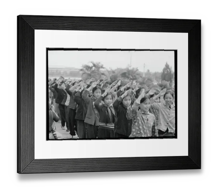 Framed Print : North Vietnamese School Kids Salute 1973