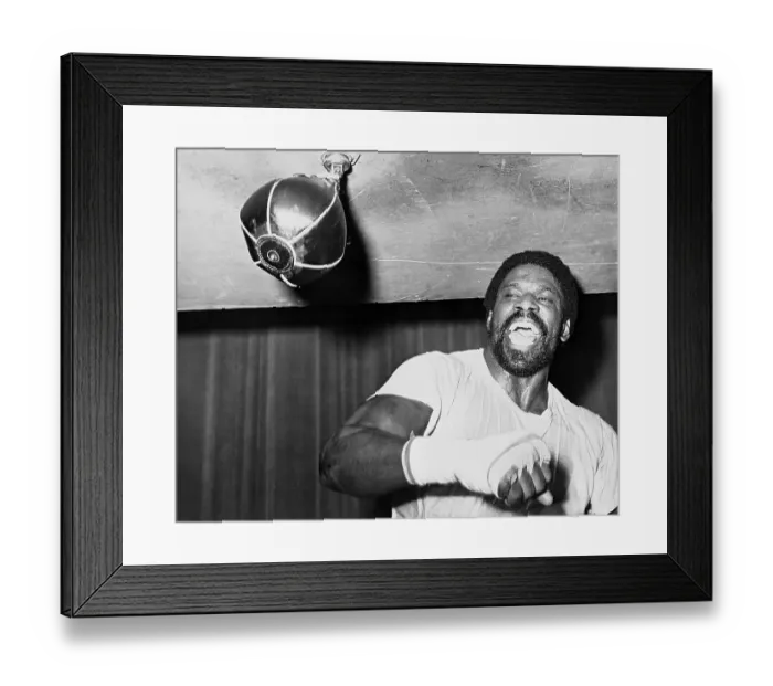 Framed Print : Ron Lyle. Heavyweight figther training on the light bag. Framed Print : Ron Lyle. Heavyweight figther training on the light bag.