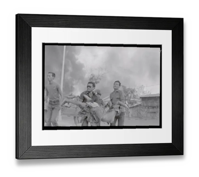 Framed Print : Men Carrying a Wounded Person Framed Print : Men Carrying a Wounded Person