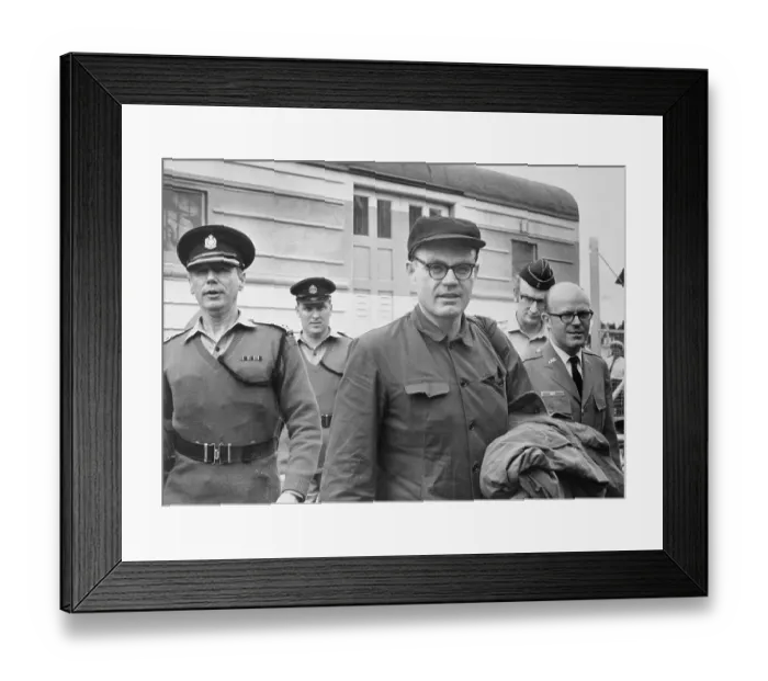 Framed Print : Freed CIA Agent John T. Downey Being Escorted at Train Station