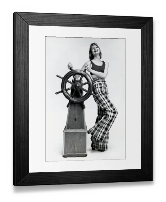 Framed Print : Fashion Model Posed at Ships Wheel Framed Print : Fashion Model Posed at Ships Wheel