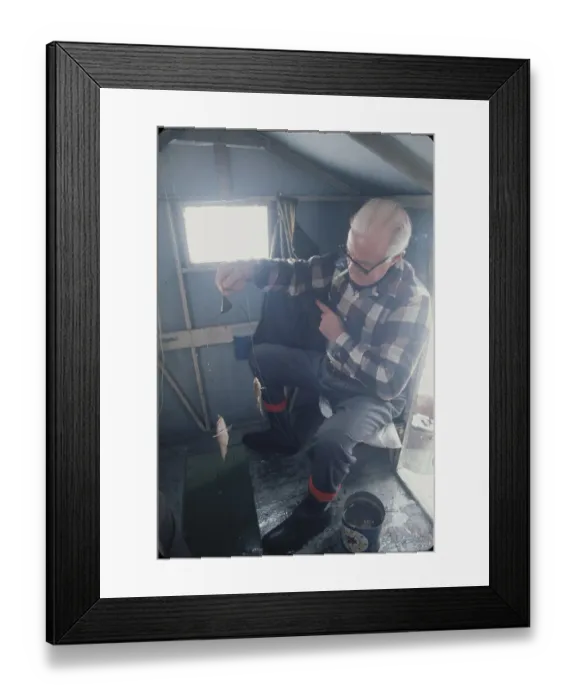 Framed Print : Man Ice Fishing Framed Print : Man Ice Fishing